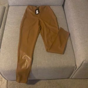 Faux leather pants, size 10, tan color. Very stylish